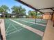 Community shuffleboard courts with covered seating at 2055 S Floral Ave # 146, Bartow, FL 33830