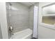 Clean bathroom with tiled shower/tub combo at 210 Wilder Rd, Lakeland, FL 33809