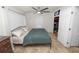 Comfortable bedroom with a king-size bed and built in shelving at 210 Wilder Rd, Lakeland, FL 33809