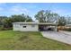 Ranch-style home with carport and large yard at 210 Wilder Rd, Lakeland, FL 33809