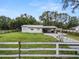 Ranch-style home with carport and fenced yard at 210 Wilder Rd, Lakeland, FL 33809