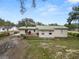 Back of house, deck, and yard at 210 Wilder Rd, Lakeland, FL 33809