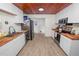 Modern kitchen with butcher block countertops and stainless steel appliances at 210 Wilder Rd, Lakeland, FL 33809