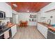 Open kitchen with stainless steel appliances and wood countertops at 210 Wilder Rd, Lakeland, FL 33809