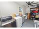 Laundry room with washer, dryer, and storage at 210 Wilder Rd, Lakeland, FL 33809