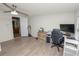 Home office with desk, computer, and dog crate at 210 Wilder Rd, Lakeland, FL 33809