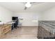 Bright home office with desk and dog crate at 210 Wilder Rd, Lakeland, FL 33809