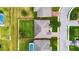 Aerial view of a house with a large backyard at 332 Lake Mariana Way, Auburndale, FL 33823