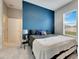 Spacious bedroom with a king-size bed and ensuite bathroom at 332 Lake Mariana Way, Auburndale, FL 33823