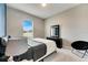 Cozy bedroom with a full-size bed and a window at 332 Lake Mariana Way, Auburndale, FL 33823