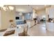 Spacious kitchen with granite countertops, stainless steel appliances, and an island at 332 Lake Mariana Way, Auburndale, FL 33823