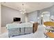 Living room showcasing sectional sofa and modern decor at 332 Lake Mariana Way, Auburndale, FL 33823