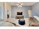 Relaxing living room with sectional sofa and large TV at 332 Lake Mariana Way, Auburndale, FL 33823