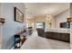 Open living room with sectional sofa and view to backyard at 332 Lake Mariana Way, Auburndale, FL 33823