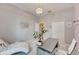 Home office with desk, chaise lounge, and natural light at 332 Lake Mariana Way, Auburndale, FL 33823