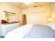 Bedroom with king-size bed and white dresser at 4268 Buffum Pl, Lakeland, FL 33813