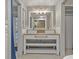 Double vanity bathroom with stylish light fixtures at 4409 Hallam Hill Ln, Lakeland, FL 33813