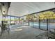 Spacious pool area with covered patio and seating at 4409 Hallam Hill Ln, Lakeland, FL 33813