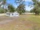 Newly renovated house exterior with landscaping at 515 S Charleston Ave, Fort Meade, FL 33841