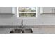 Stainless steel double sink with granite countertop at 515 S Charleston Ave, Fort Meade, FL 33841
