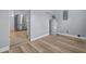 Laundry room with vinyl flooring and a hot water heater at 515 S Charleston Ave, Fort Meade, FL 33841