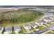 Aerial view of houses and a green landscape at 5460 Siltstone St, Lakeland, FL 33811