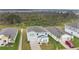 Two-story house, gray exterior, two-car garage at 5460 Siltstone St, Lakeland, FL 33811