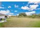 Large backyard with grassy area and grill at 5460 Siltstone St, Lakeland, FL 33811
