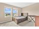 Bedroom with double bed and view of neighborhood at 5460 Siltstone St, Lakeland, FL 33811