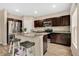 Modern kitchen with stainless steel appliances and granite countertop at 5460 Siltstone St, Lakeland, FL 33811