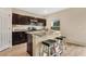 Modern kitchen with stainless steel appliances and kitchen island at 5460 Siltstone St, Lakeland, FL 33811