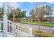 View from porch, showcasing a pond and neighborhood at 5472 Penway Dr, Orlando, FL 32814