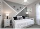 Bedroom with daybed and stylish wall decor at 549 Silver Course Radl, Ocala, FL 34472