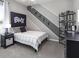 Bedroom with a full-size bed and BMX theme at 549 Silver Course Radl, Ocala, FL 34472