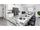 Spacious kitchen with an island and stainless steel appliances at 549 Silver Course Radl, Ocala, FL 34472