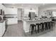 Spacious kitchen with island, stainless steel appliances, and breakfast bar at 549 Silver Course Radl, Ocala, FL 34472