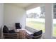 Sunroom with wicker furniture and view of backyard at 549 Silver Course Radl, Ocala, FL 34472