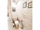 Small half bathroom with toilet and pedestal sink at 5805 Danterbury Ct, Lakeland, FL 33810