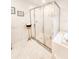 Bathroom with shower stall and a separate tub at 5805 Danterbury Ct, Lakeland, FL 33810