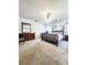 Primary bedroom with a king-size bed and large windows at 5805 Danterbury Ct, Lakeland, FL 33810