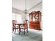 Formal dining room with a china cabinet and a chandelier at 5805 Danterbury Ct, Lakeland, FL 33810