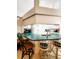 Kitchen features a breakfast bar and green countertops at 5805 Danterbury Ct, Lakeland, FL 33810