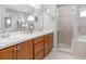 Elegant bathroom with double vanity and large shower at 721 Bayside Blvd, Winter Haven, FL 33881