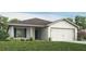 One-story home with a two-car garage and landscaped lawn at 721 Bayside Blvd, Winter Haven, FL 33881