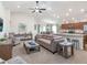 Spacious living room with a large sectional sofa and fireplace at 721 Bayside Blvd, Winter Haven, FL 33881