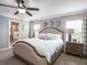 Spacious main bedroom with king-size bed and ensuite bathroom at 721 Bayside Blvd, Winter Haven, FL 33881