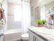 Clean bathroom with bathtub, shower, and modern vanity at 734 Sw 77Th Cir, Ocala, FL 34474