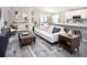 Open concept living room featuring a comfortable sofa and media console at 734 Sw 77Th Cir, Ocala, FL 34474