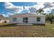 Newly built home with a spacious backyard and patio at 1021 Rhodes S Rd, Haines City, FL 33844