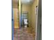 Bathroom with toilet, shower, and tiled floor at 3640 Knights Station Rd, Lakeland, FL 33810